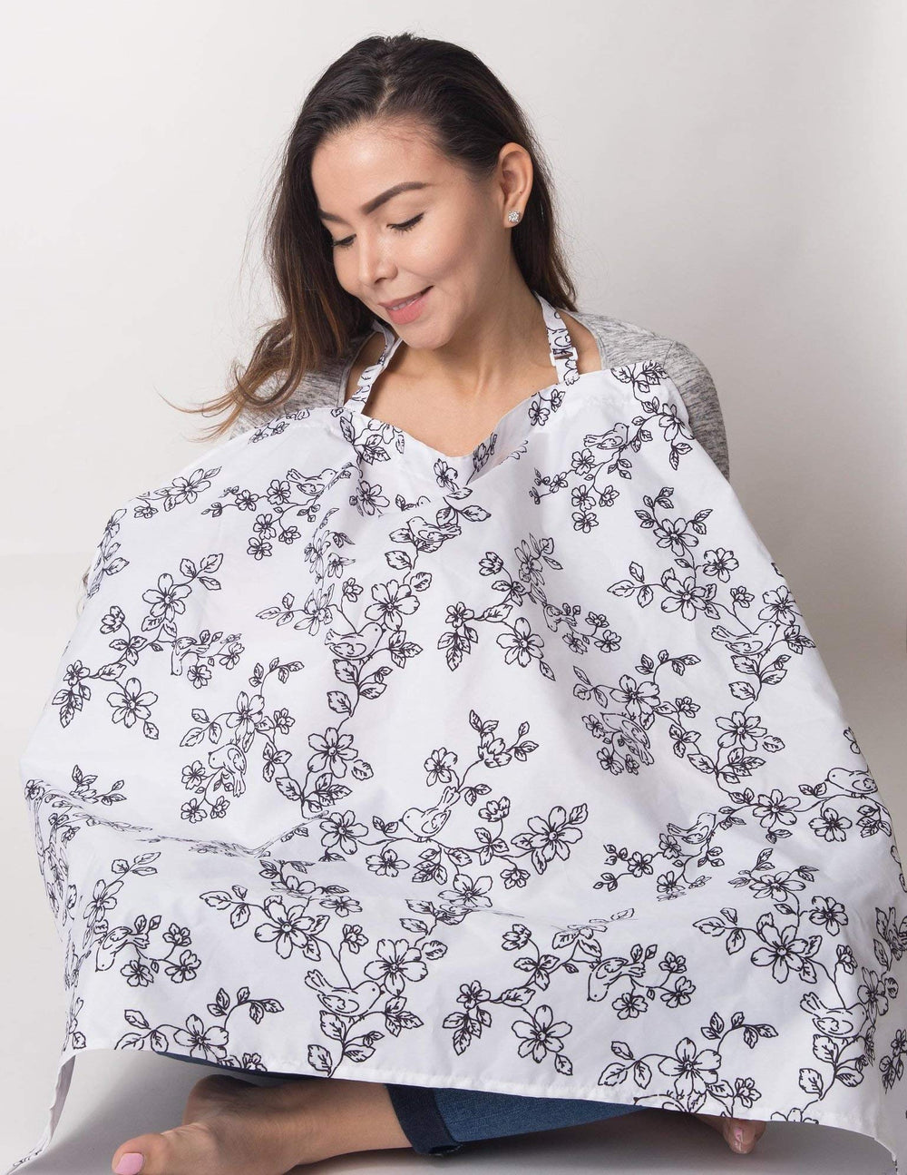 Little Me nursing cover interior pockets keep feeding essentials handy.