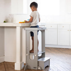 Little Partners Foldable Toddler Tower folded for storage, space saving design after activity