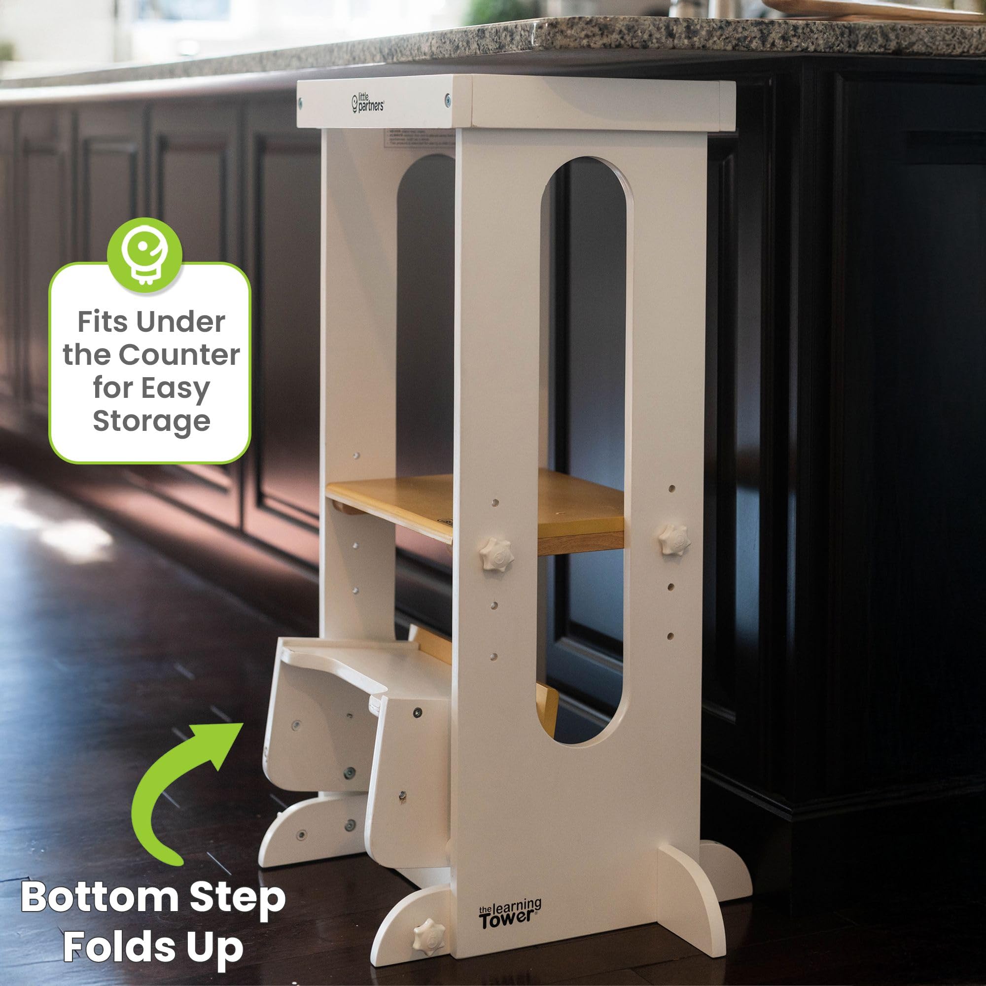 Little Partners Foldable Tower in a kitchen scene supports safe cooking and hands-on learning.