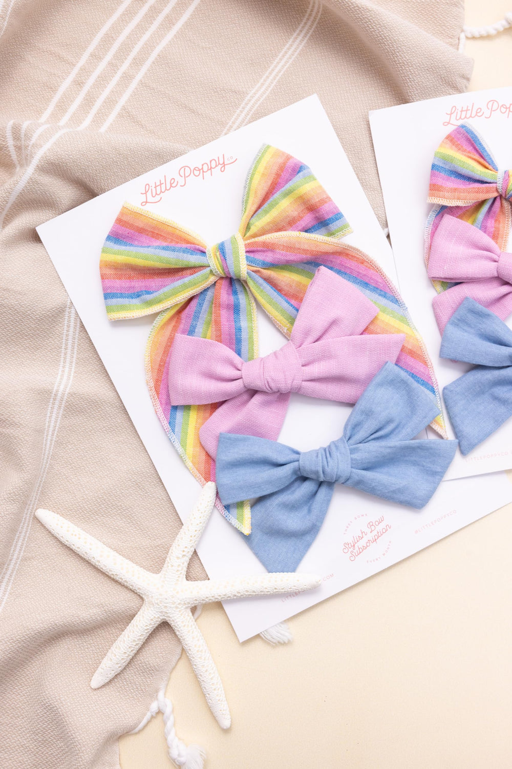 Little Poppy Co oversize bow on reversible clip for statement looks.