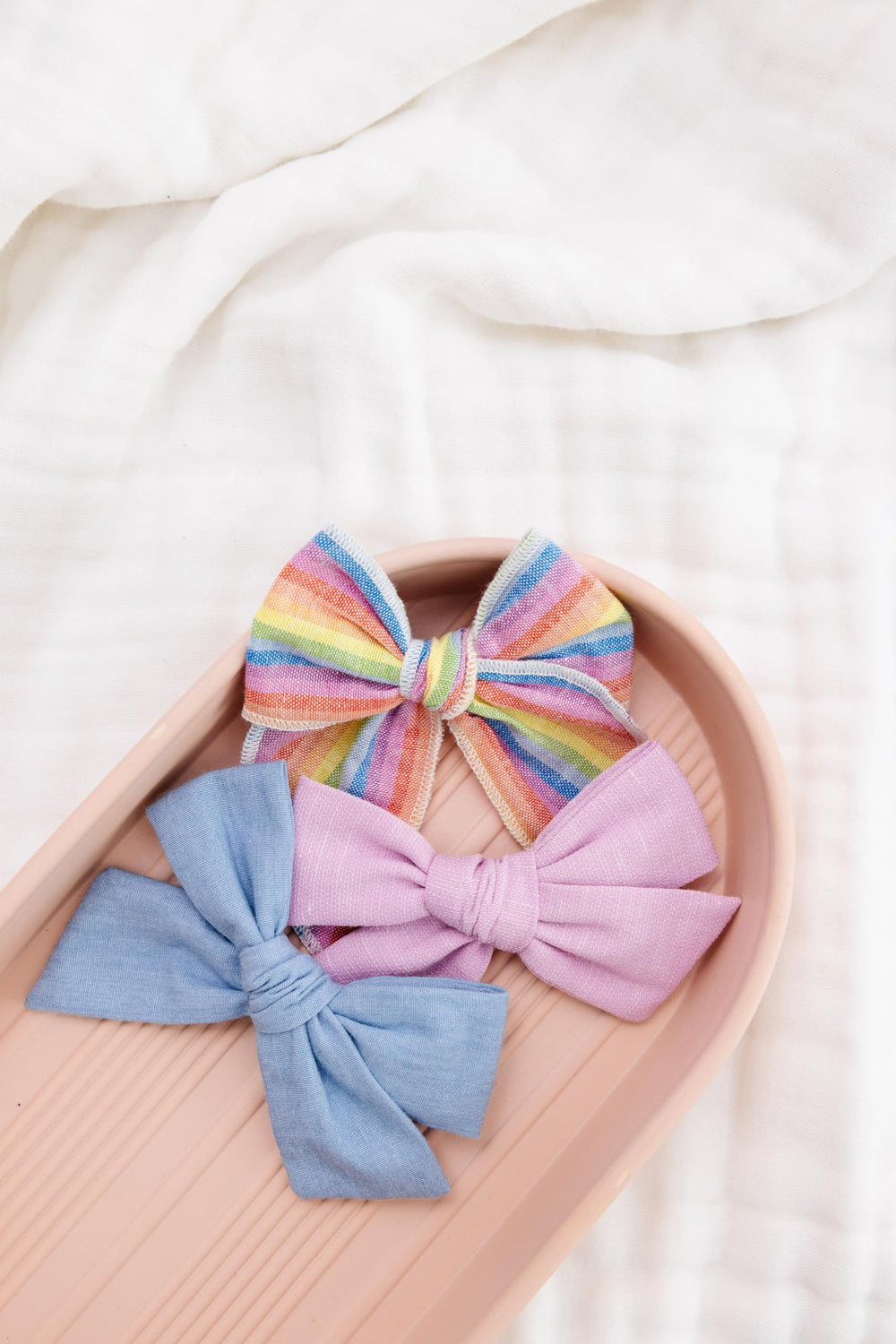 Little Poppy Co reversible alligator clip bow for versatile styling.