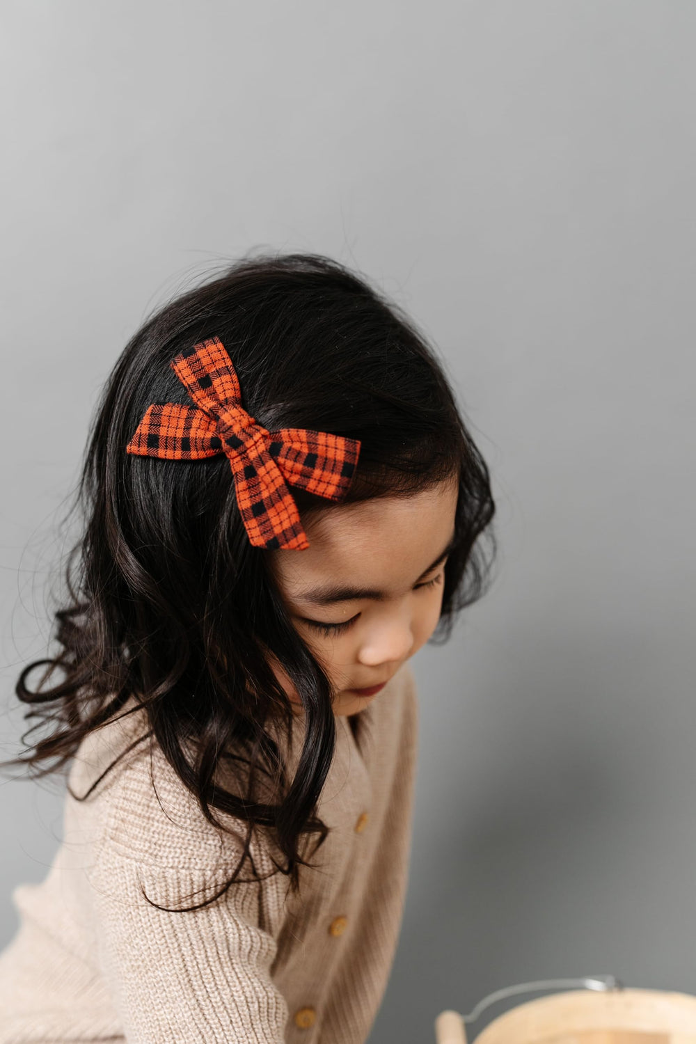 Close-up of nylon headband style showing soft, stretchy fit for newborns to adults.