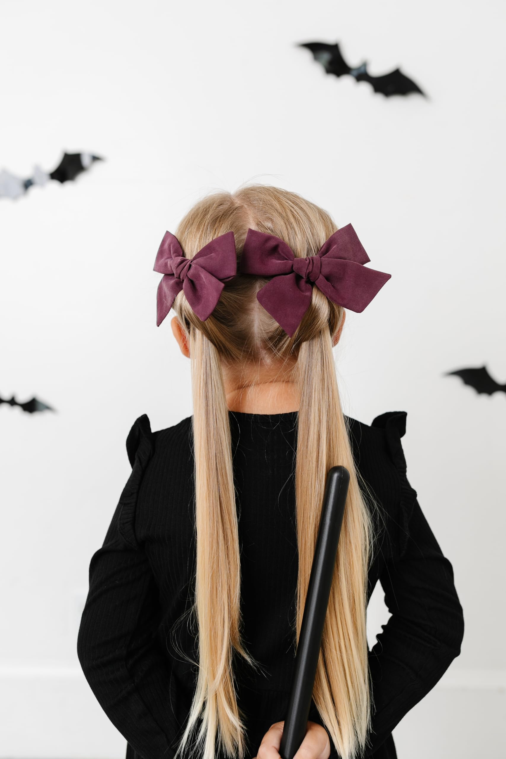 Little Poppy Co oversize bow on heavy clip for bold style.