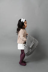 Little Poppy Co reversible clip bow design shown for side-switch convenience.