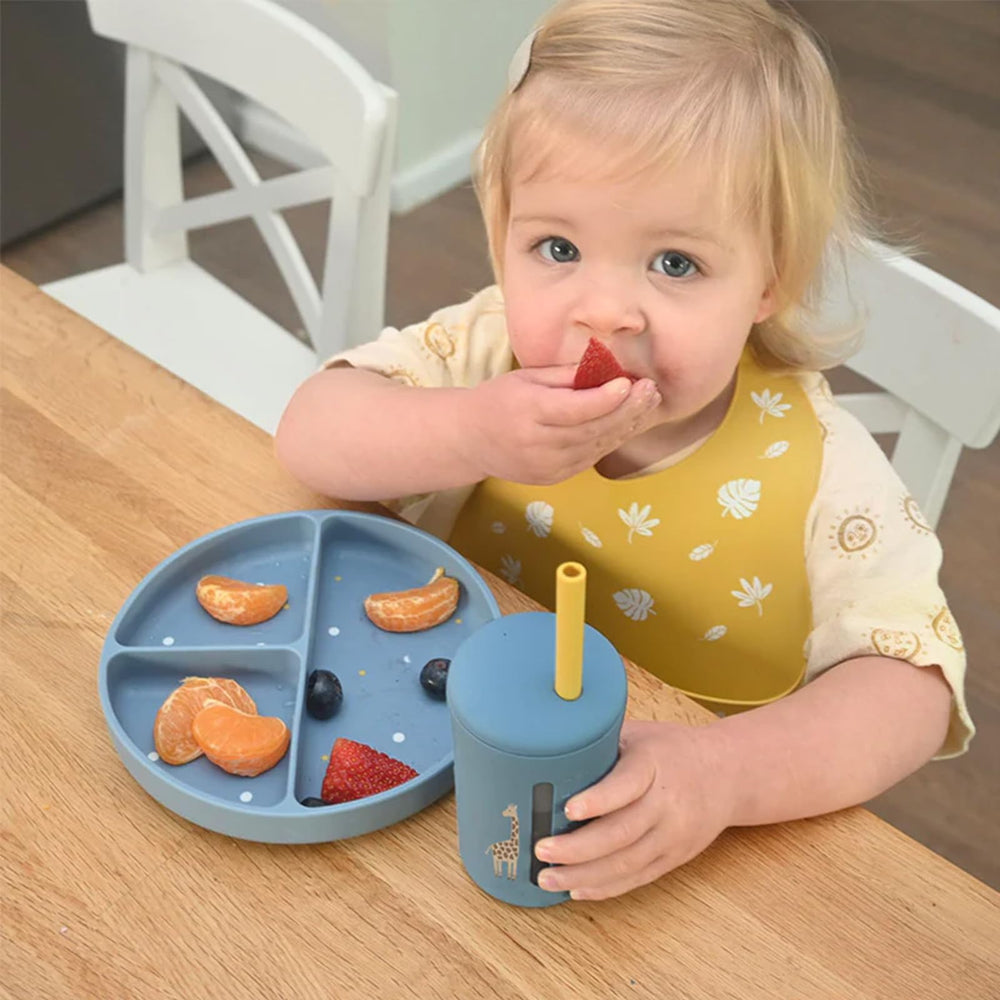 Little Rawr bib features an adjustable snap closure for a secure fit.