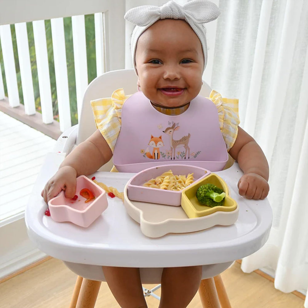 Little Rawr waterproof silicone bib highlighting durability during meals