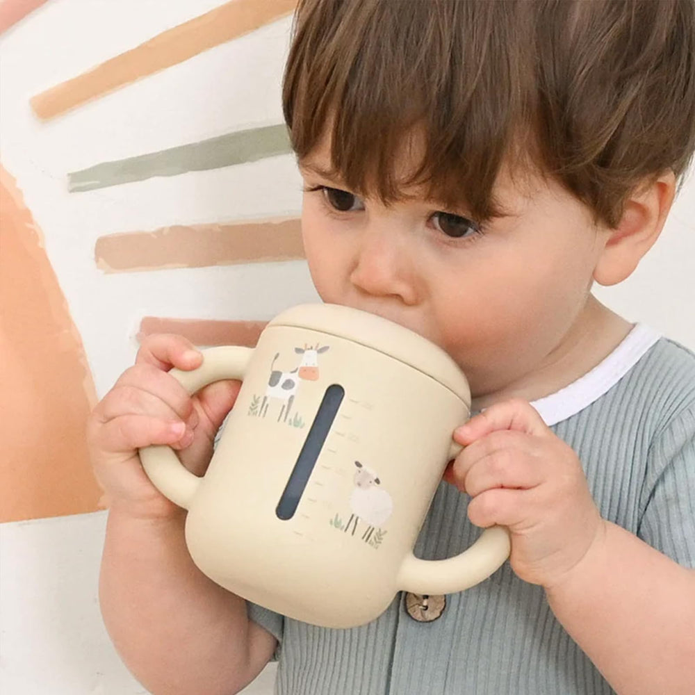 Little Rawr sippy cup animal patterns engaging babies during meals
