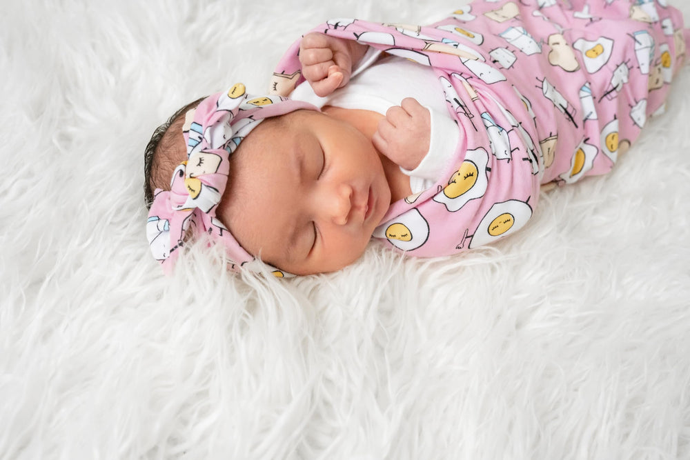 Adult pajamas coordinate with the Little Sleepies family look