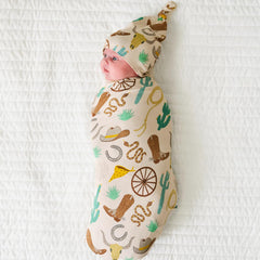 Close-up of bamboo viscose fabric showing softness and stretch for secure swaddling by Little Sleepies.