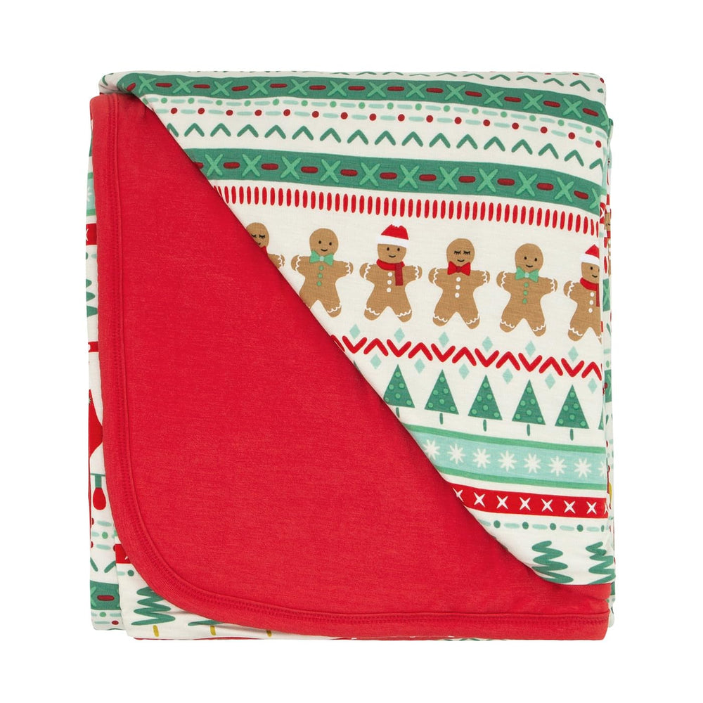Little Sleepies Christmas blanket with soft viscose for cozy, gentle snuggles by the tree.