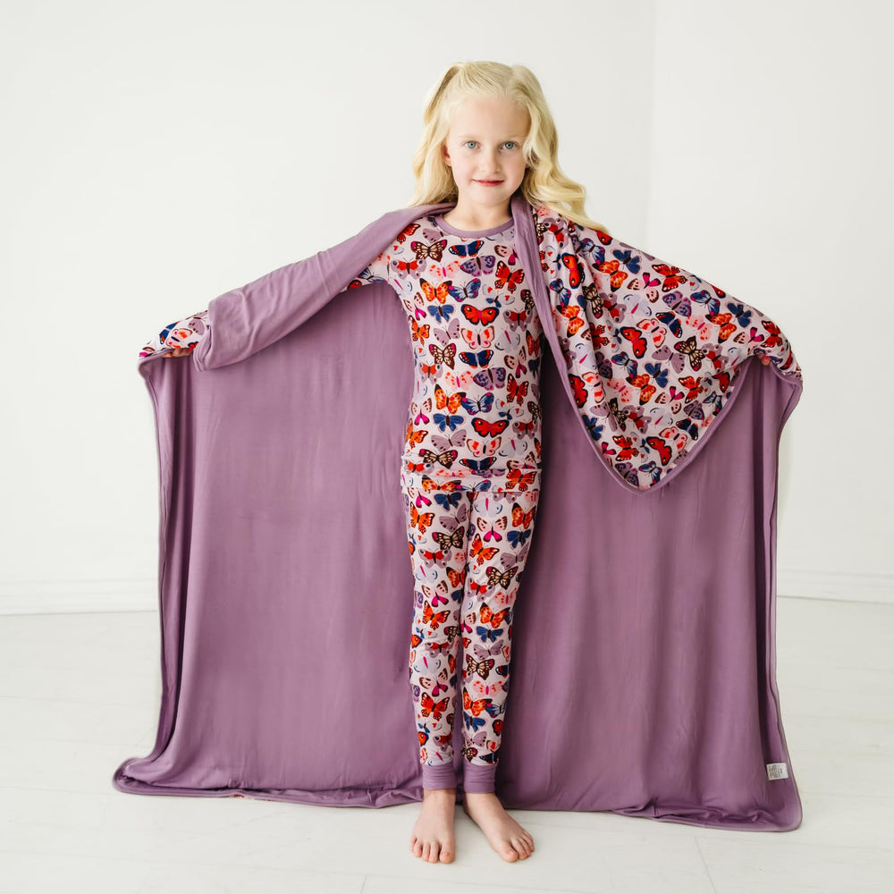 Double-sided design with a coordinating solid reverse visible.