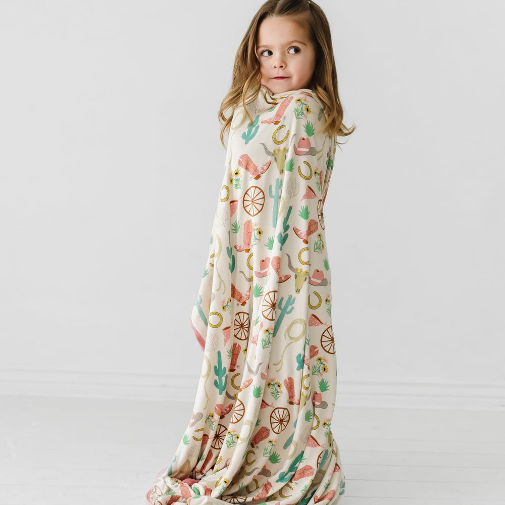 Little Sleepies Cloud Blanket matching with coordinating pajamas for family photo moments.