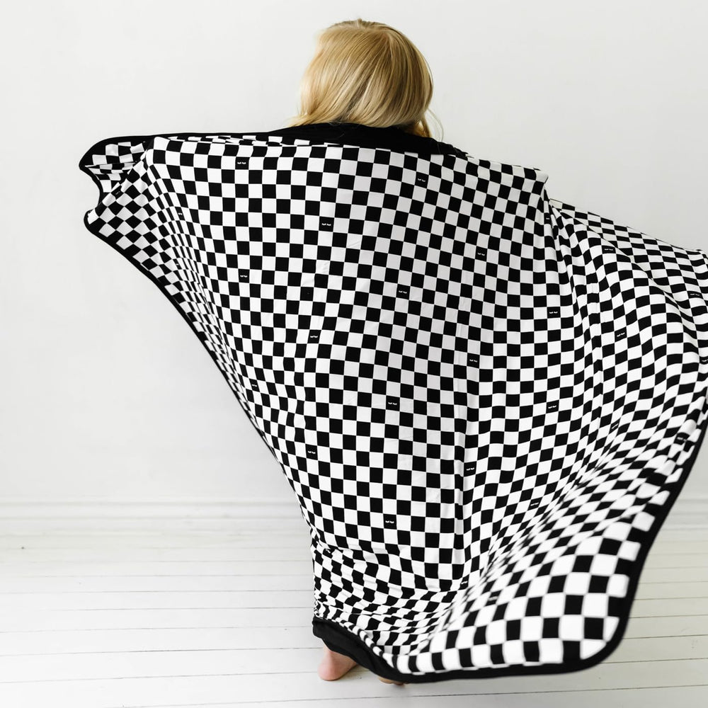 Little Sleepies Cloud Blanket coordinates with matching sheets and pajamas for coordinated looks.
