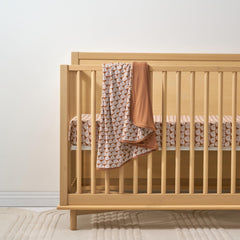 Little Sleepies Cloud Blanket Rust Rainbows paired with cozy pajamas for family photos
