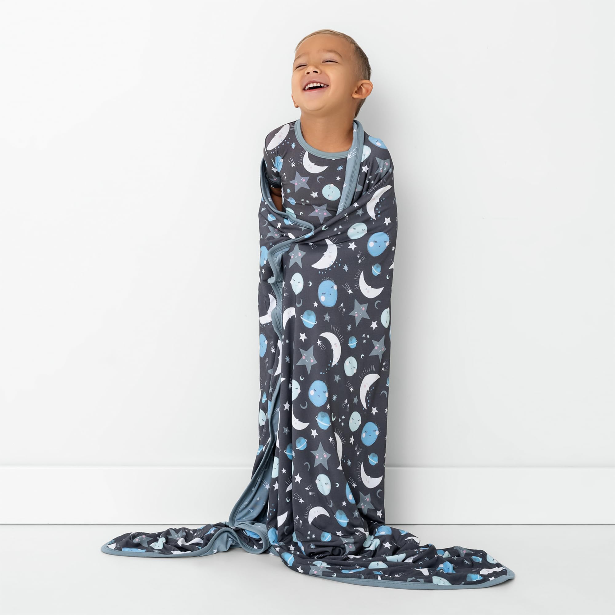 Little Sleepies Cloud Blanket travel-snuggle shows compact warmth for on-the-go.