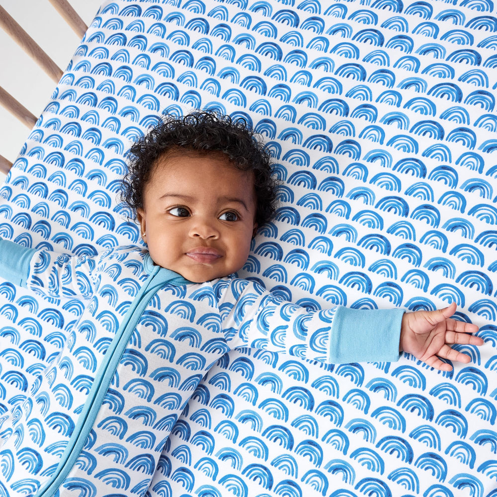 Durable, easy-care Little Sleepies crib sheets ready for machine washing.