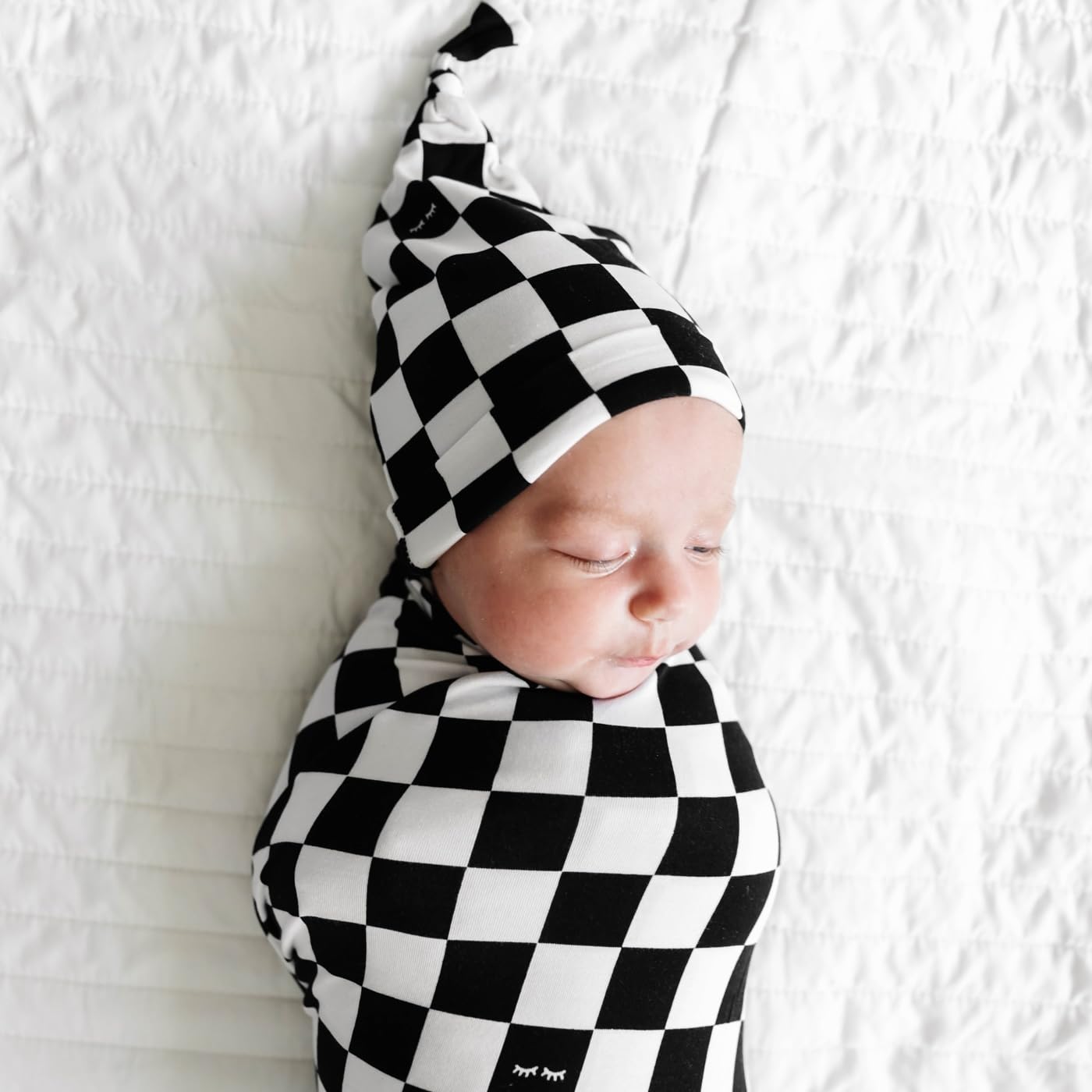 Hat fits up to about 5 months, completing the coordinated early-care look.