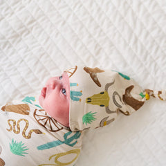 Peek-a-boo gift box from Little Sleepies for a thoughtful newborn gift set.