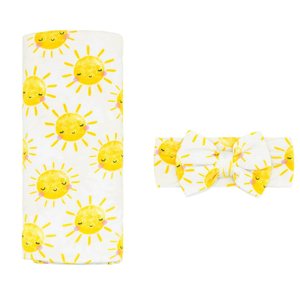 Little Sleepies Lunaluxe Sunshine swaddle blanket for newborn comfort.
