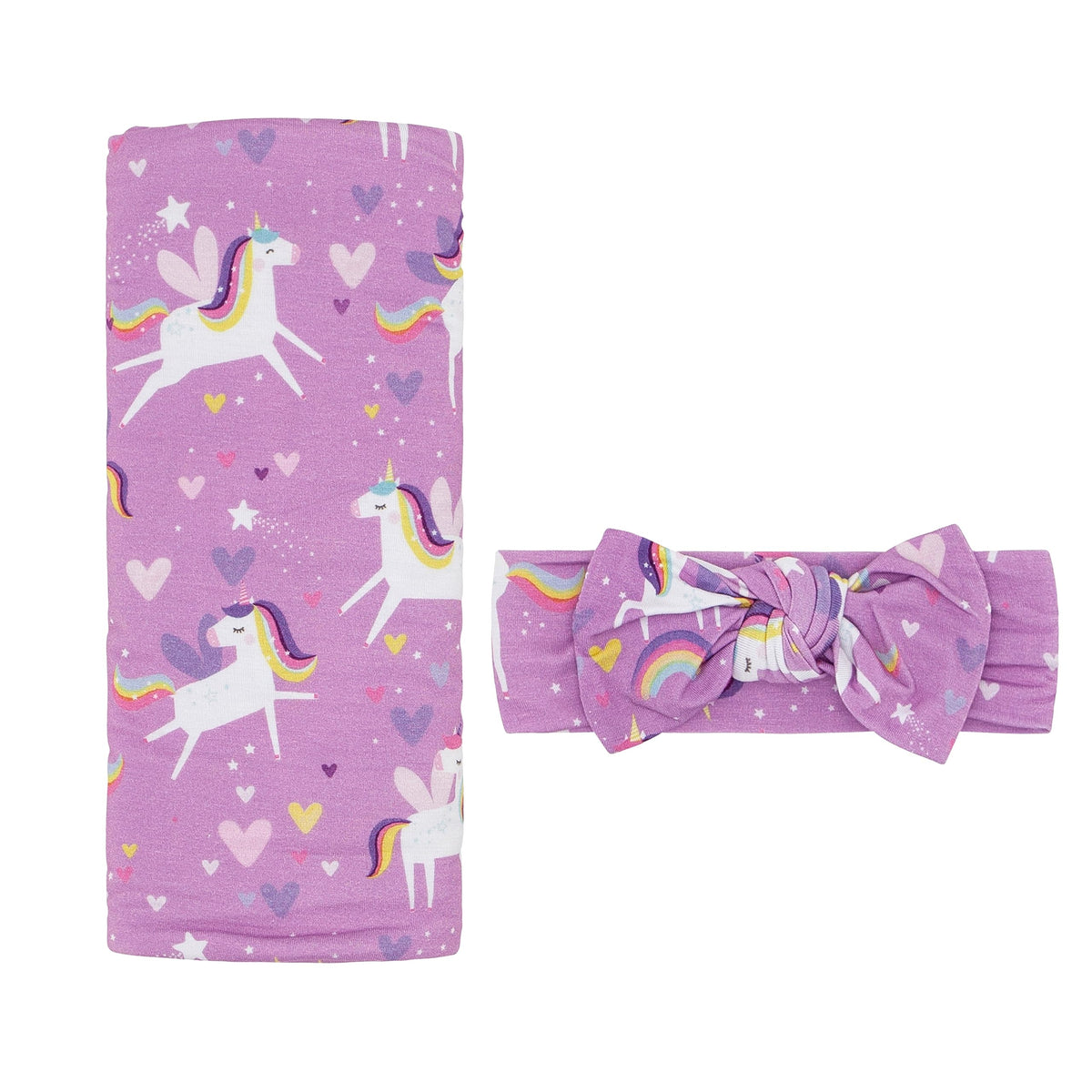 Little Sleepies Luna Luxe swaddle blanket unicorn print keeps newborns snug.