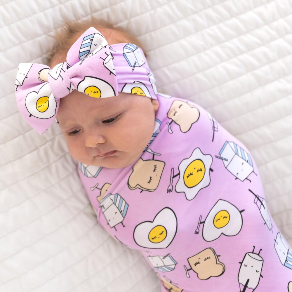 Little Sleepies Lunaluxe swaddle; versatile use as burp cloth or play mat