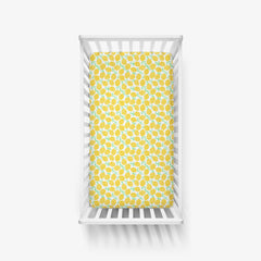 Little Sleepies matching-prints Lemon crib sheet showcases cute designs for nursery coordination.