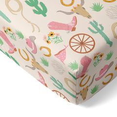 Little Sleepies pink Ready to Rodeo crib sheet with secure stretchy fit.