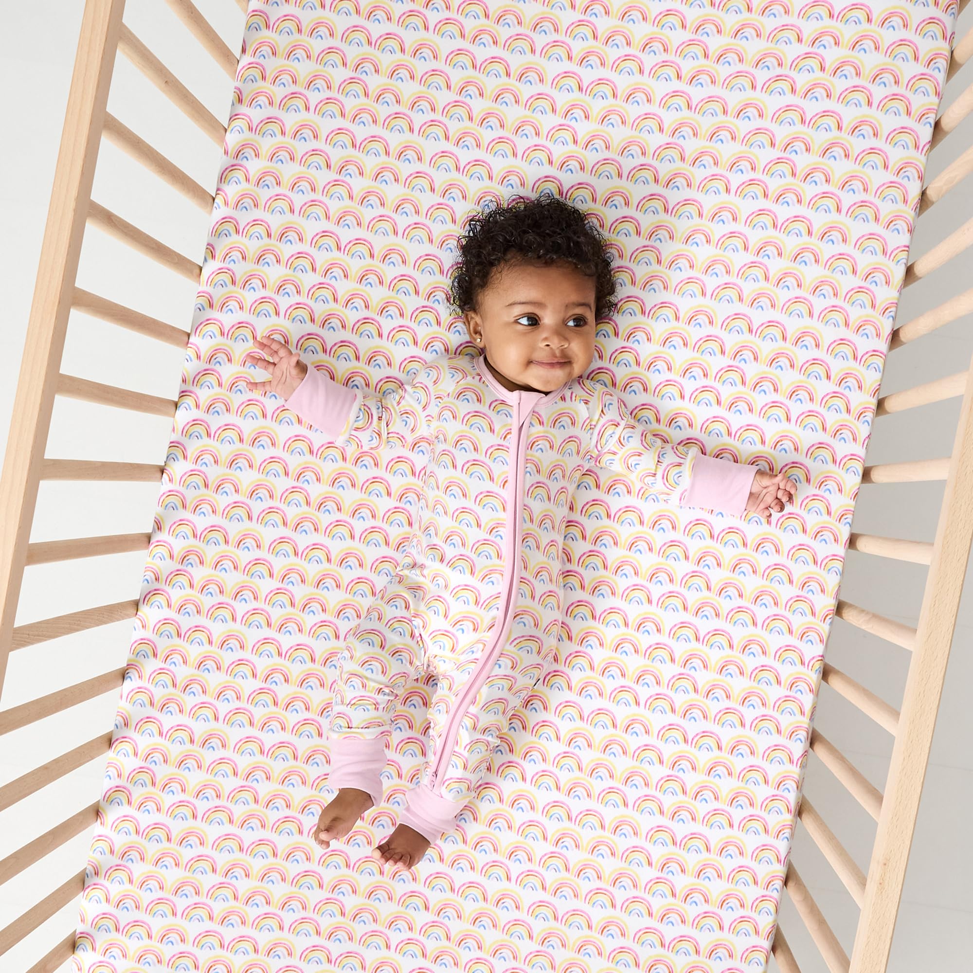 Little Sleepies Sunshine print brightens nursery while staying soft