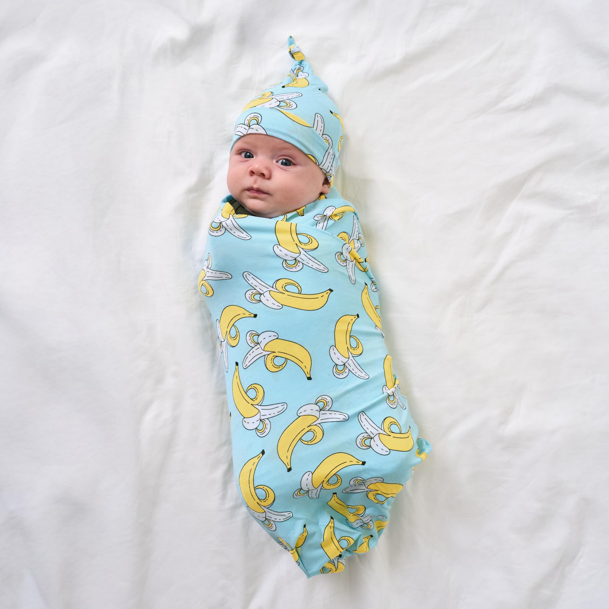 Little Sleepies banana-print swaddle doubles as a burp cloth