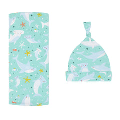 Little Sleepies Shark Soiree swaddle blanket shows breathable bamboo comfort for naps.