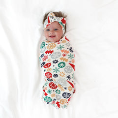 Little Sleepies swaddle close-up shows buttery-soft bamboo fabric and breathable weave.