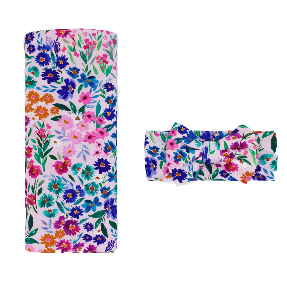 Little Sleepies swaddle in Sweet Pea showing buttery softness for cozy newborn cuddles.