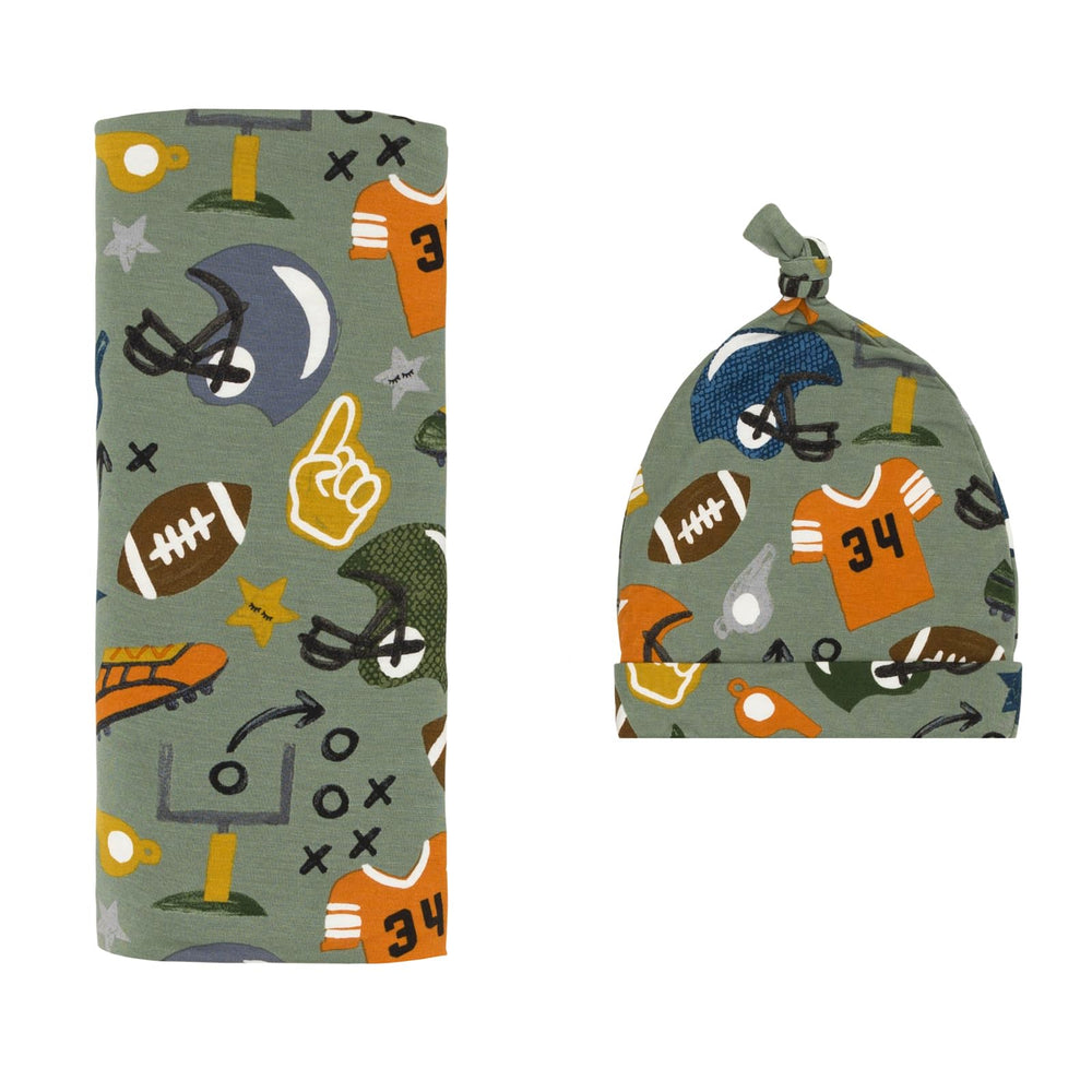 Little Sleepies Touchdown Time swaddle set with hat for cozy newborn snuggles.