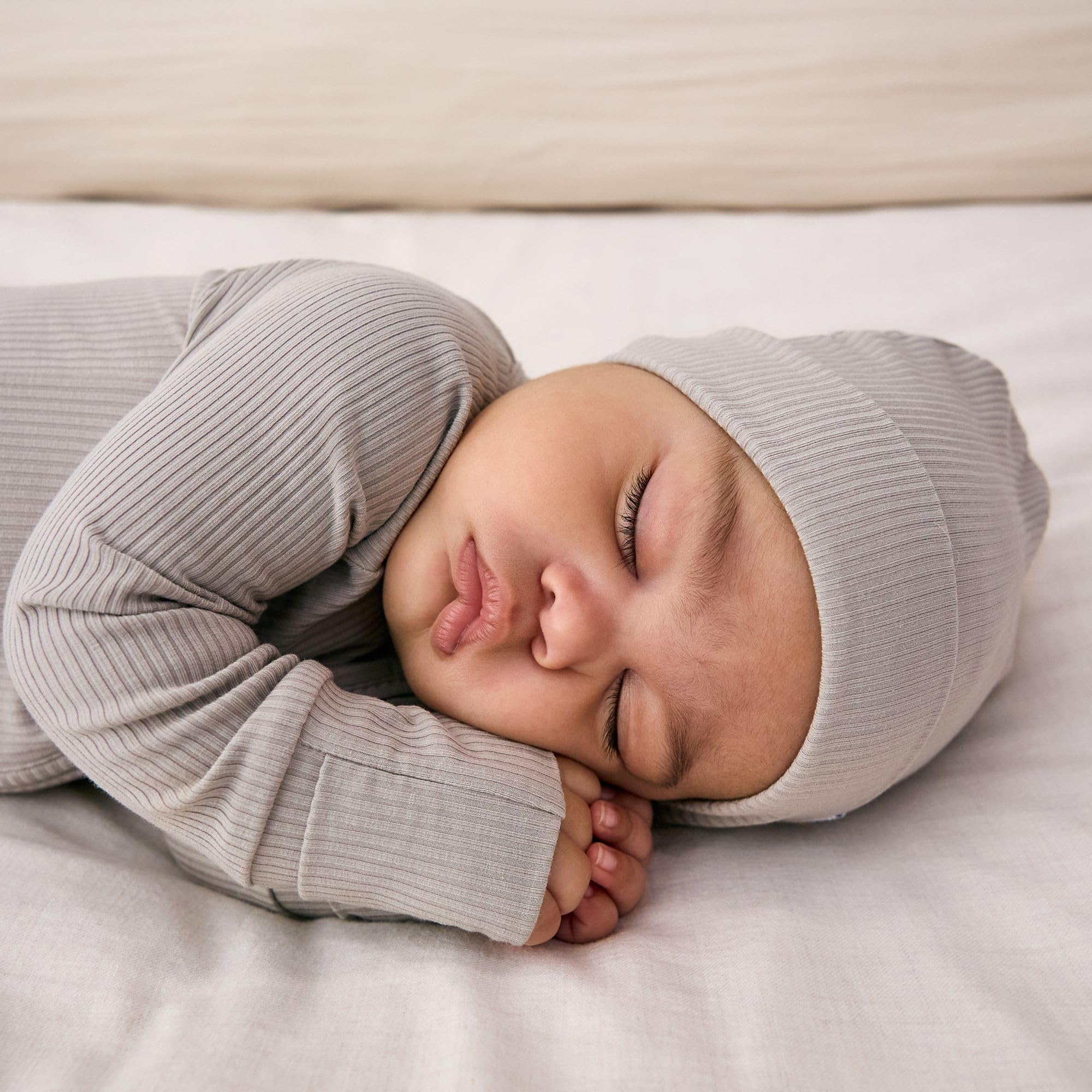 Little Sleepies u-shaped double zip offers easy night-time access