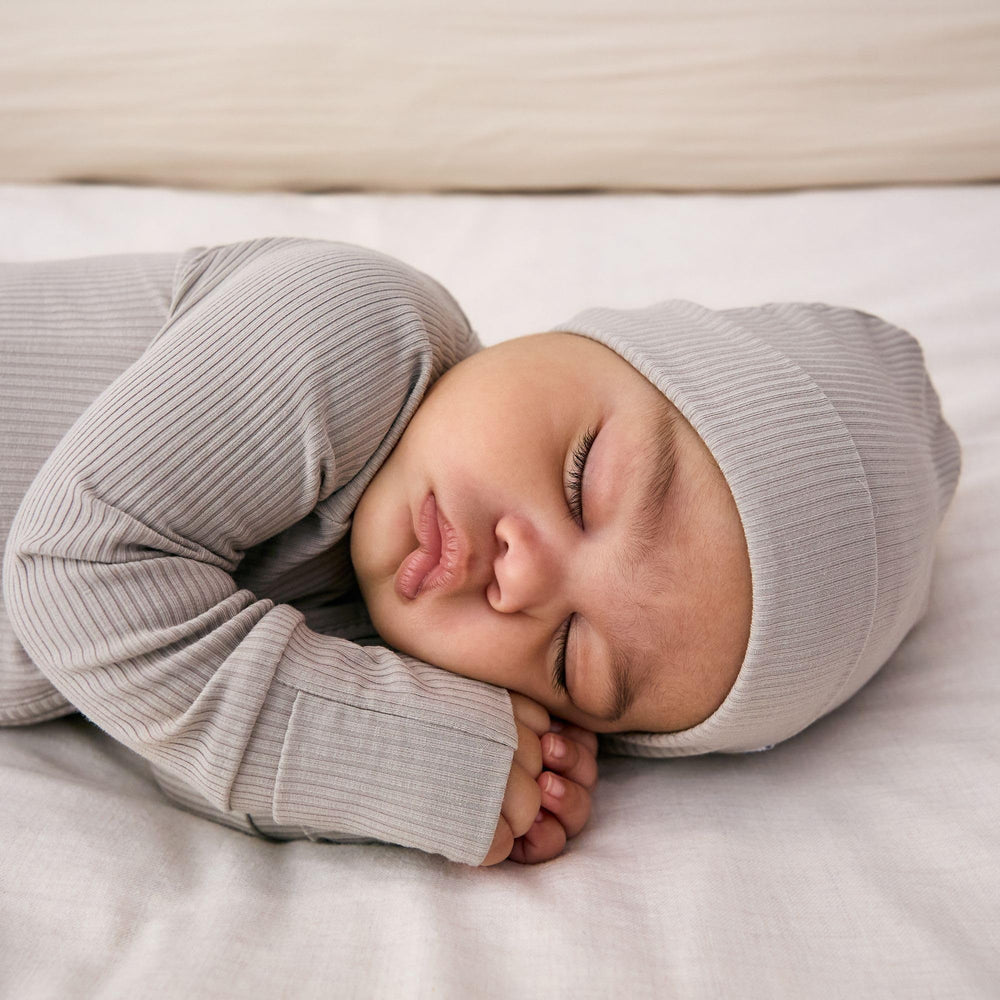 Little Sleepies u-shaped double zip offers easy night-time access