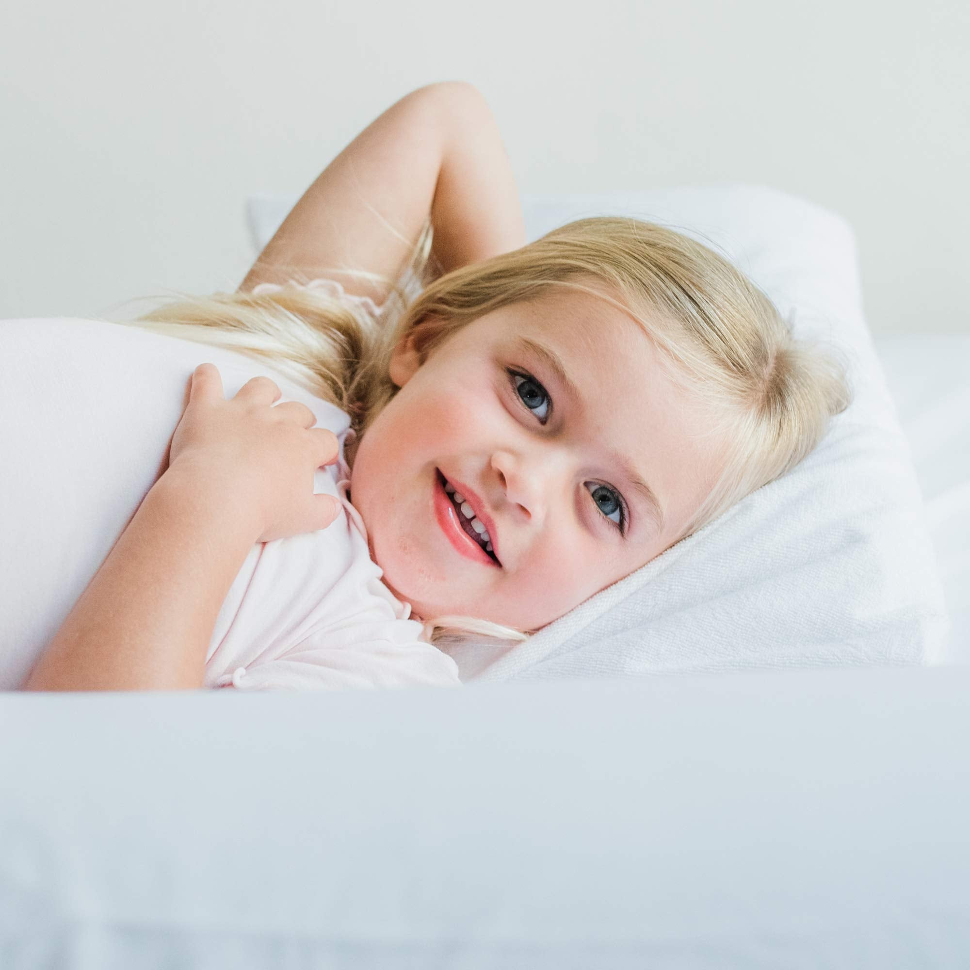Travel-compact Little Sleepy Head pillow protector shown in use
