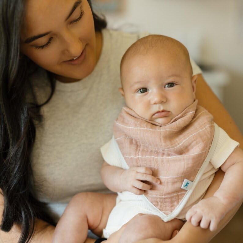 Contoured, soft edge design from Little Unicorn bandana bib for comfortable wear.