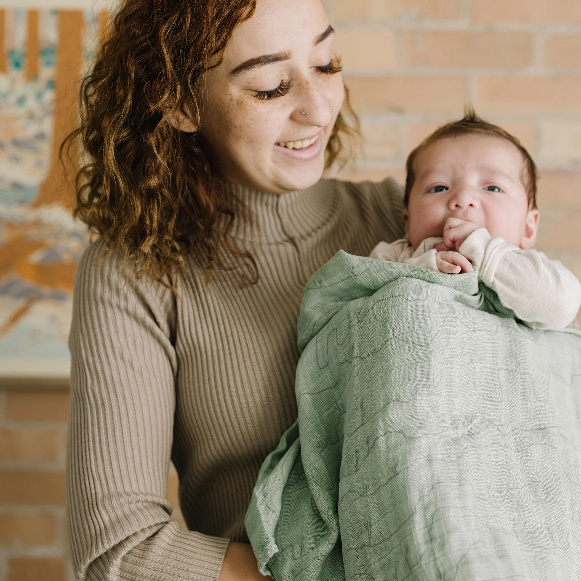 Little Unicorn Cactus Lines swaddle travel-friendly and easy to fold