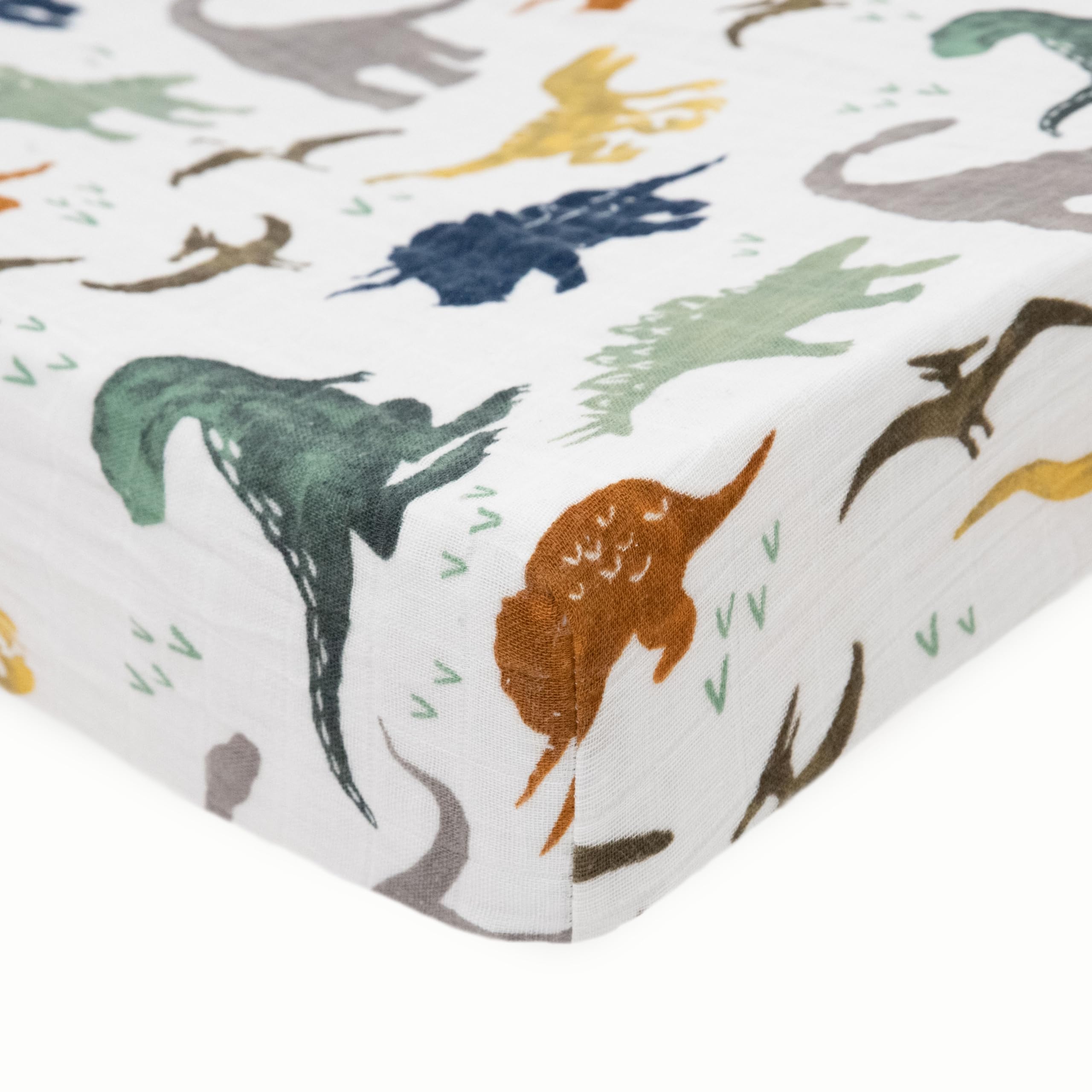 Little Unicorn Dino Friends cover, breathable muslin keeps baby comfy during diaper changes