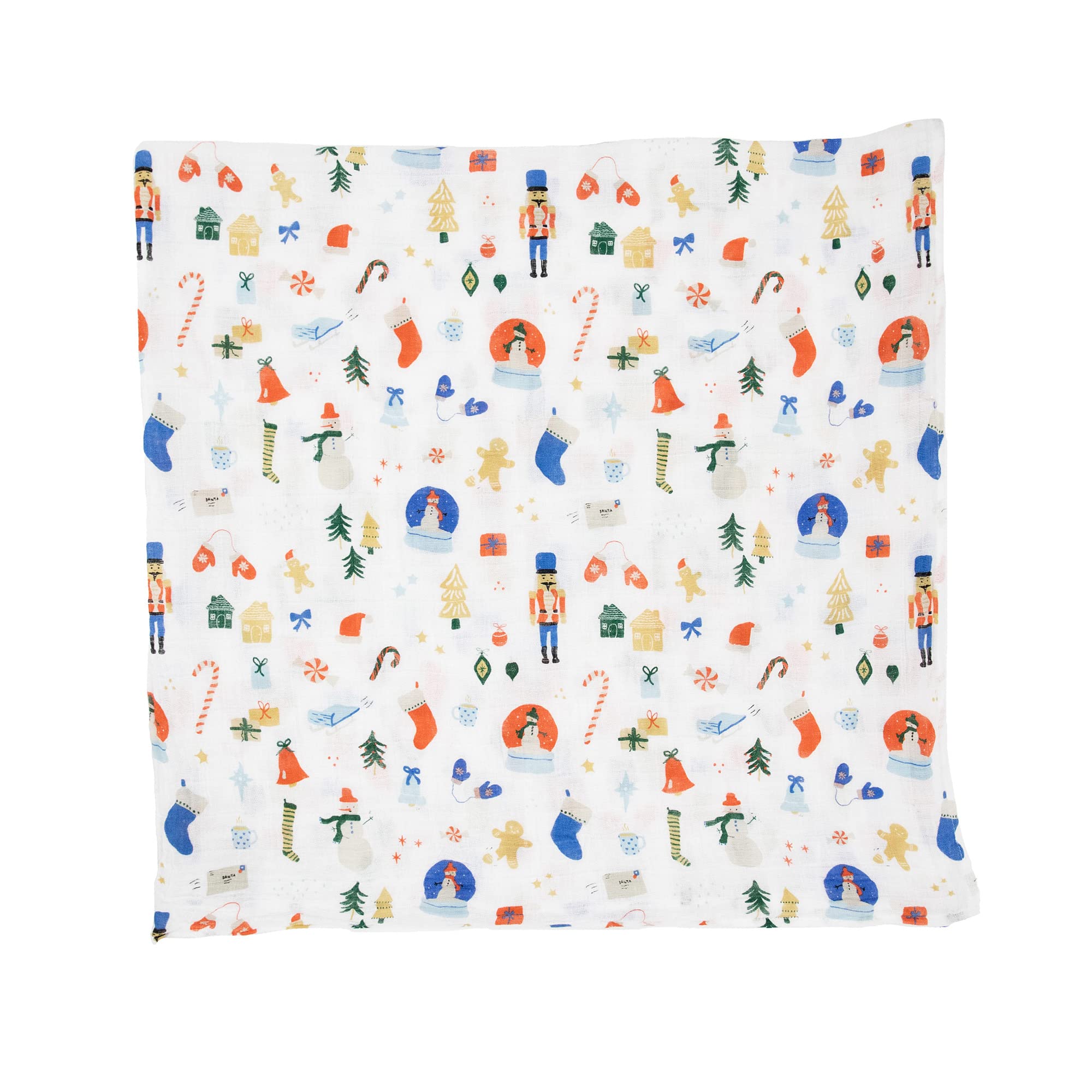 Little Unicorn Christmas Time swaddle on baby highlights cozy pattern for naps.