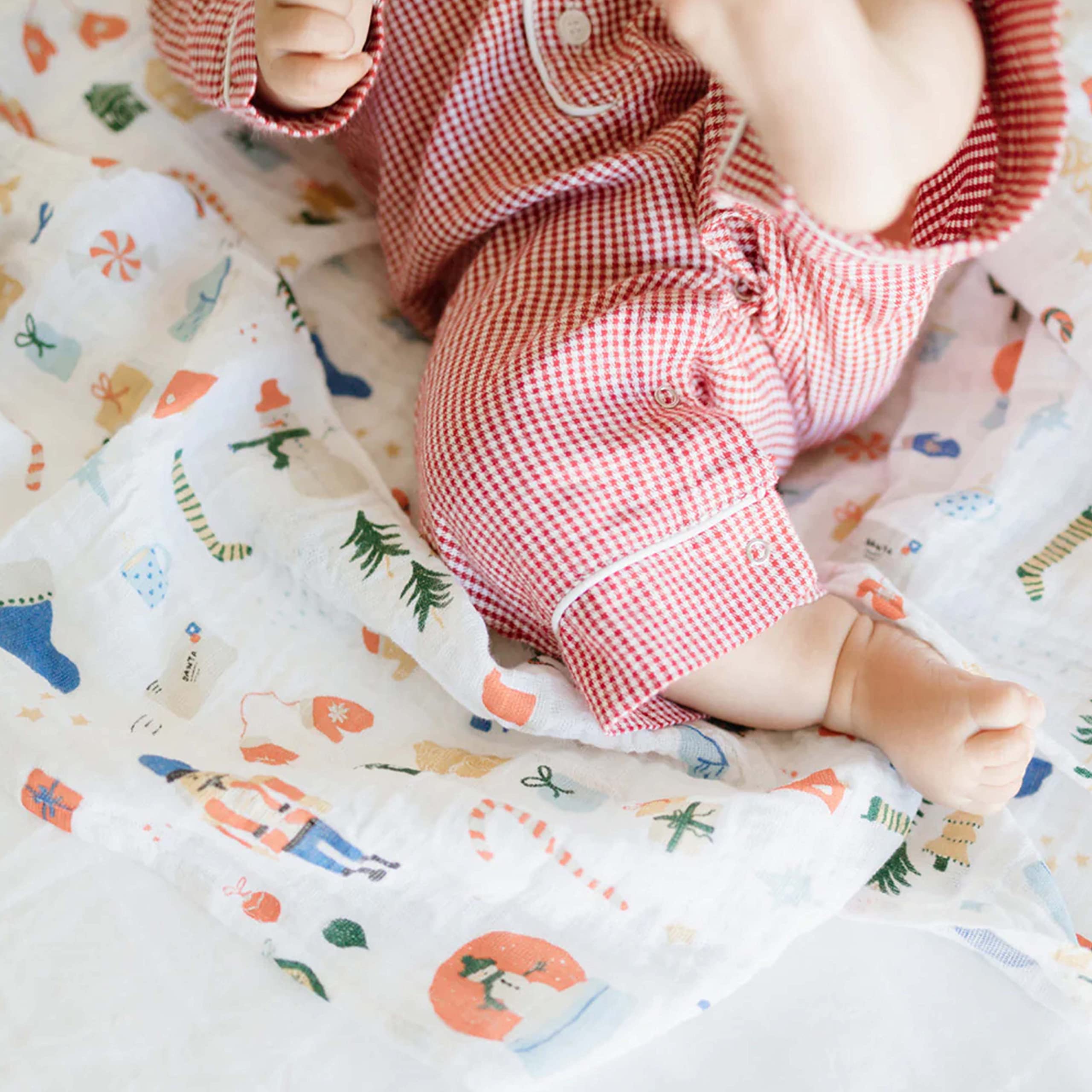 Little Unicorn Christmas Time swaddle gift packaging ideal for baby showers.