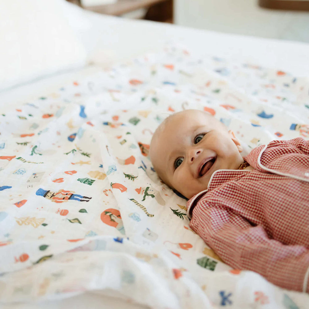 Little Unicorn Christmas Time swaddle fabric is machine washable and durable.