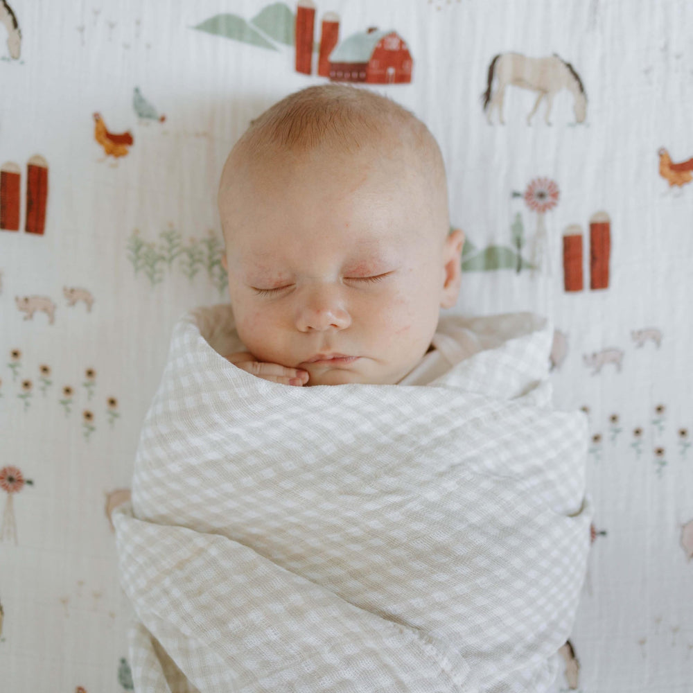 Little Unicorn compact swaddle for on-the-go travel.