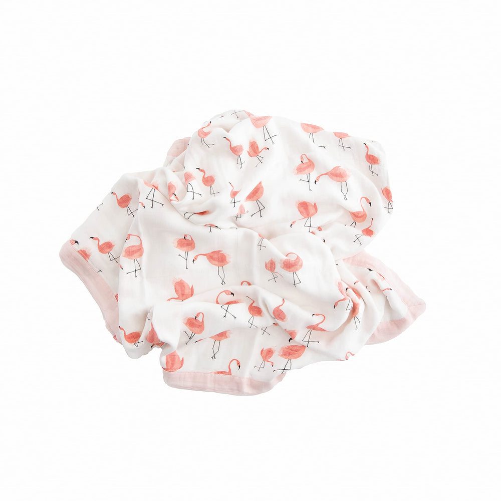 Little Unicorn Deluxe Muslin Quilt tummy-time companion for comfortable play on the floor.