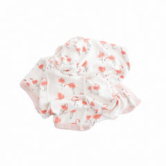 Little Unicorn Deluxe Muslin Quilt tummy-time companion for comfortable play on the floor.