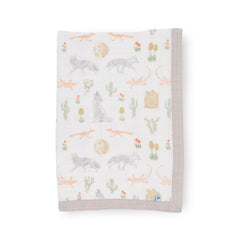 Little Unicorn Desert Night newborn quilt ultra-soft 4-layer muslin for cozy cuddles.