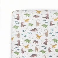 Little Unicorn Dino Pals crib sheet close-up, ultra-soft rayon knit for cozy nights.