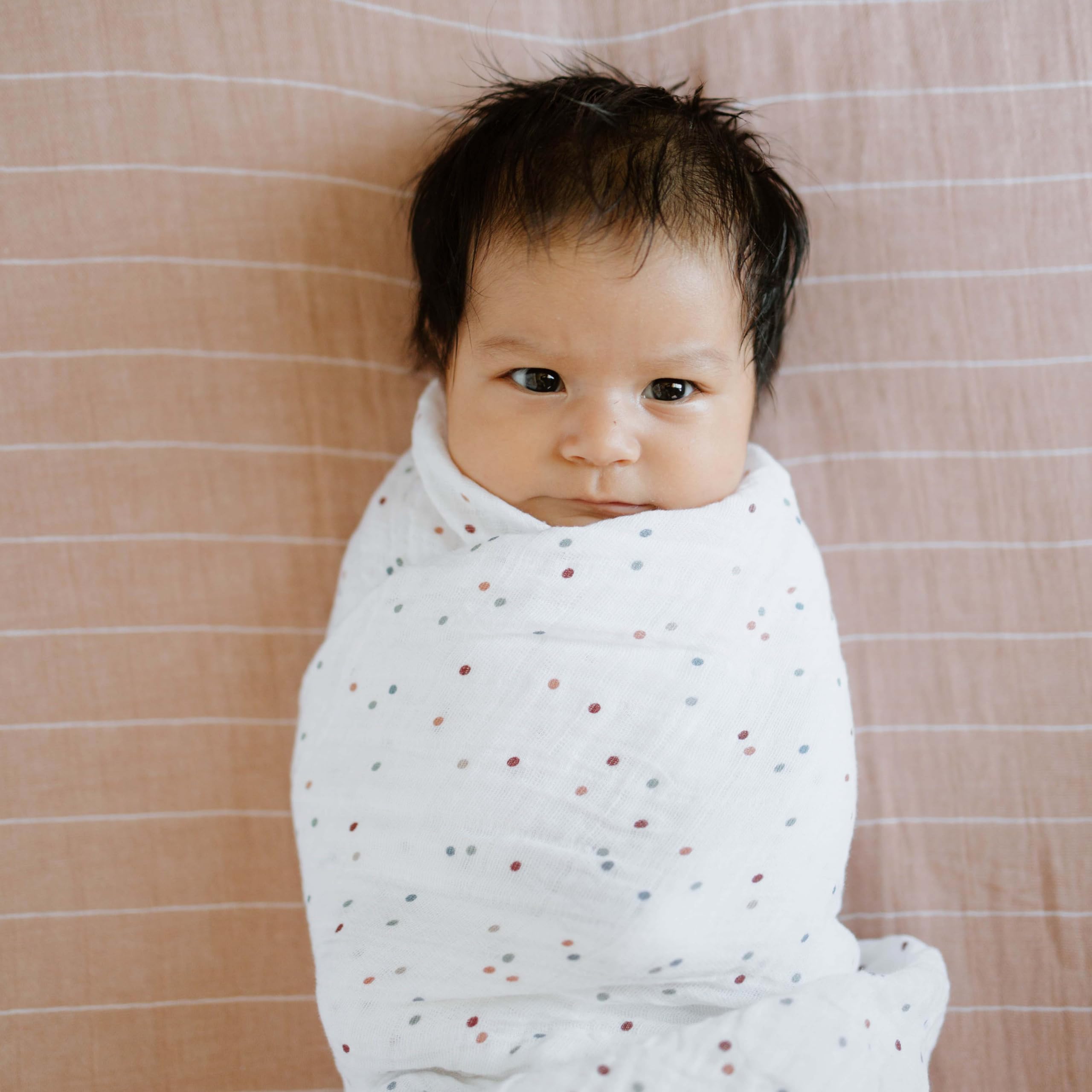 Little Unicorn dots swaddle gift-ready packaging highlights a thoughtful gift