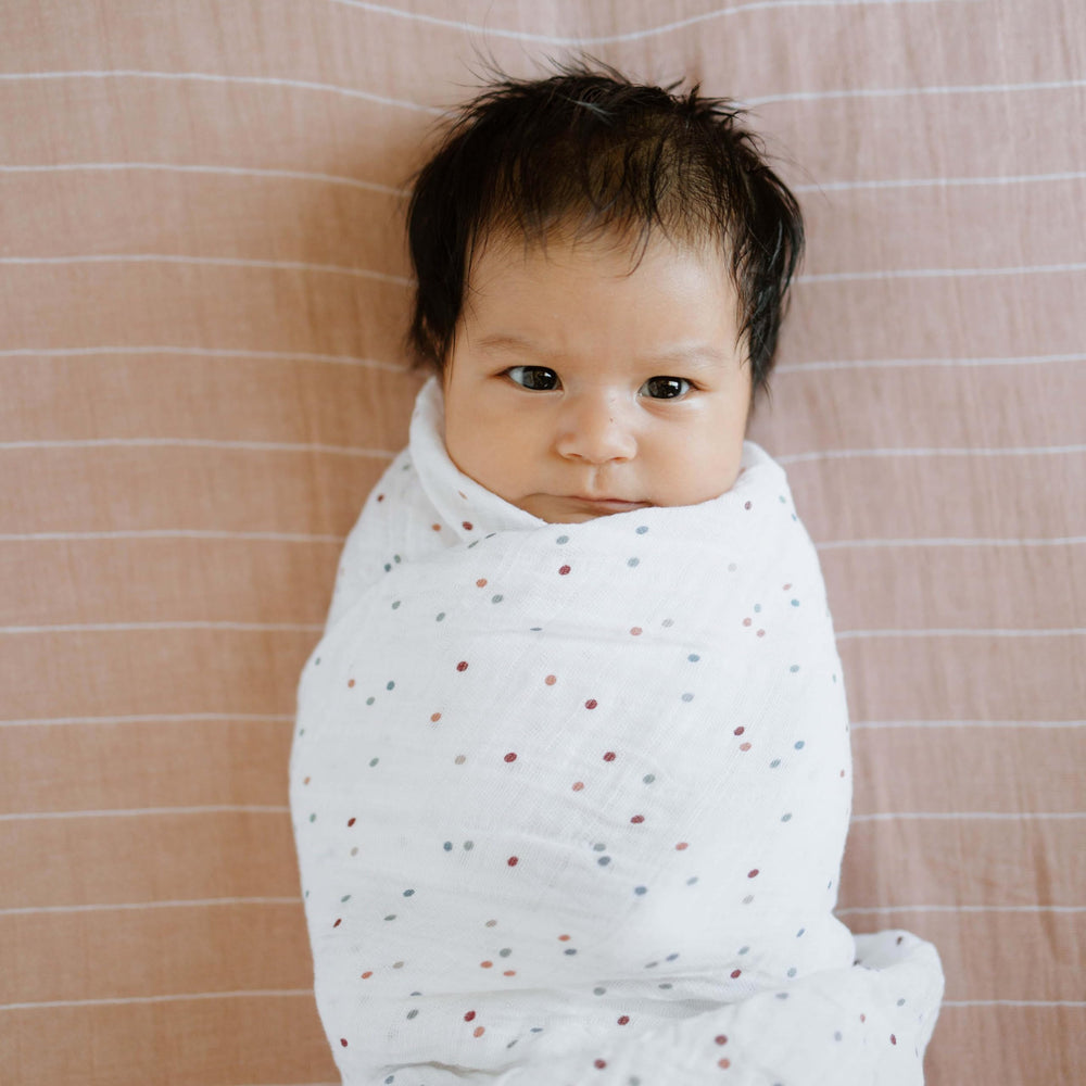 Little Unicorn dots swaddle gift-ready packaging highlights a thoughtful gift