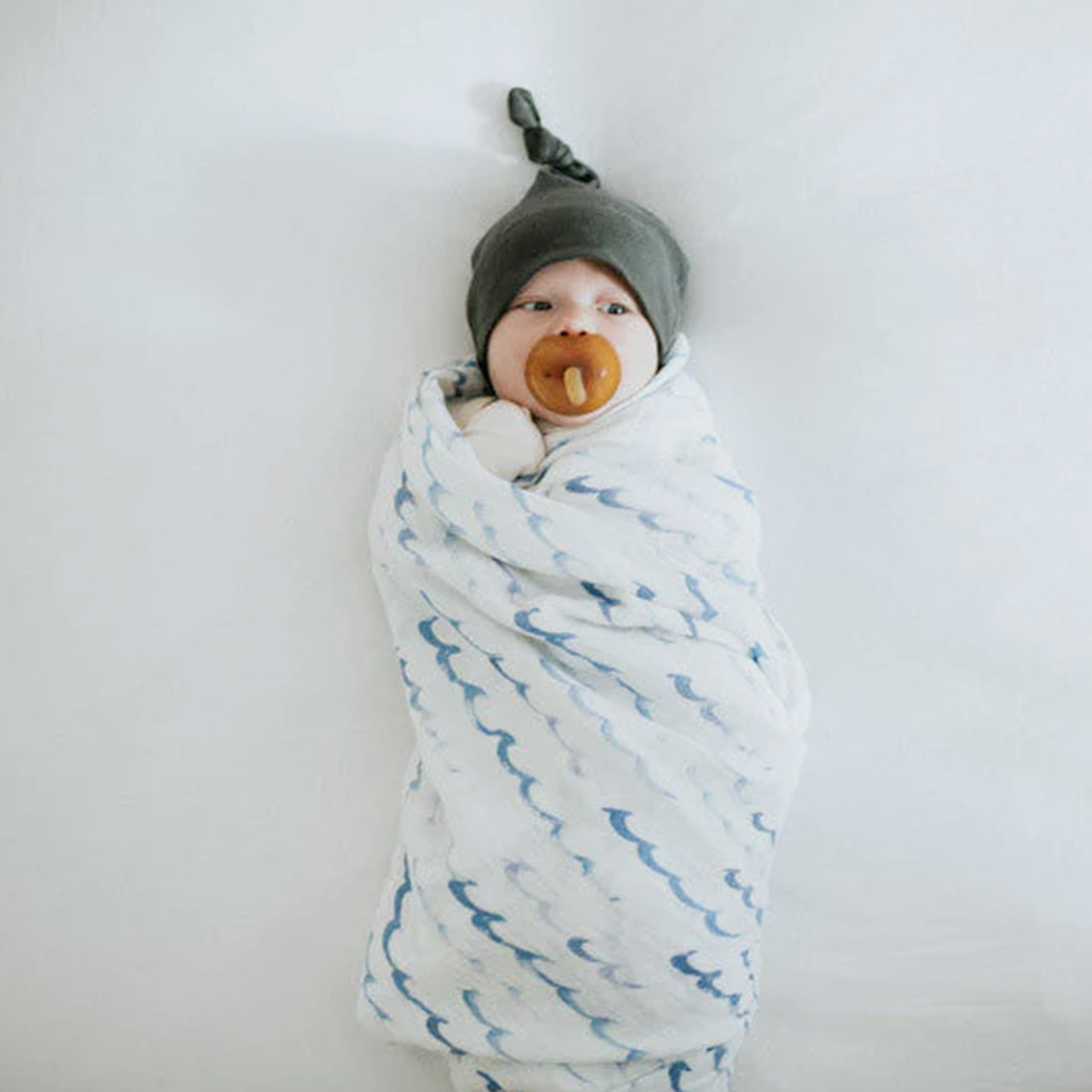 Little Unicorn easy care swaddle is machine washable and colorfast.
